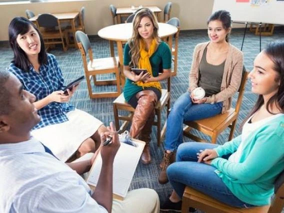 students sitting in a circle