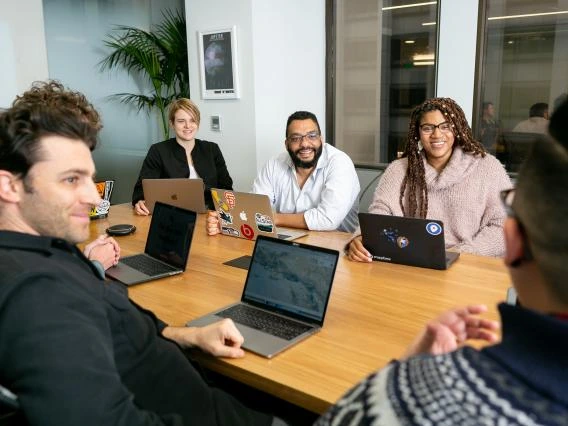 people sitting around a conference table
