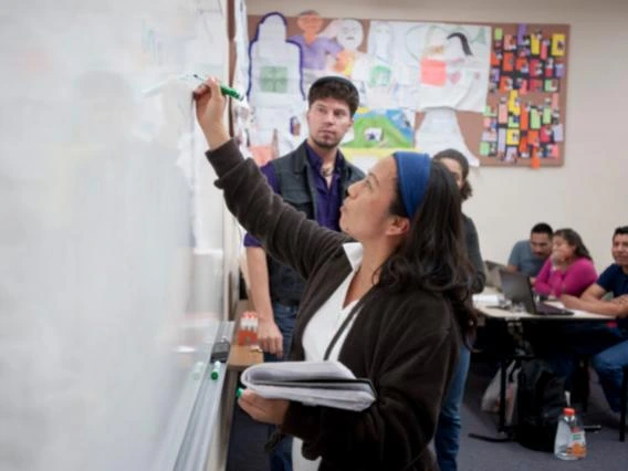 ua student at whiteboard